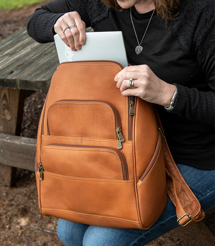 Julia ladies leather backpack holding a 14in laptop