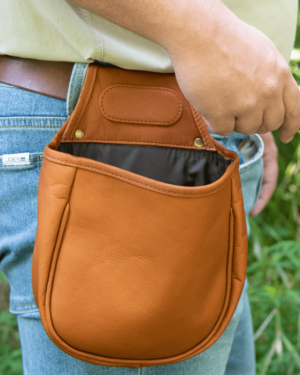 Hunter grabs shells from his Royal Shotgun Shell leather bag