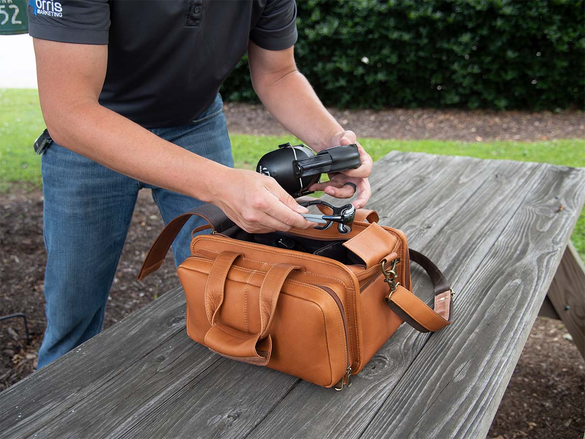 fitting gun and ammo into bag